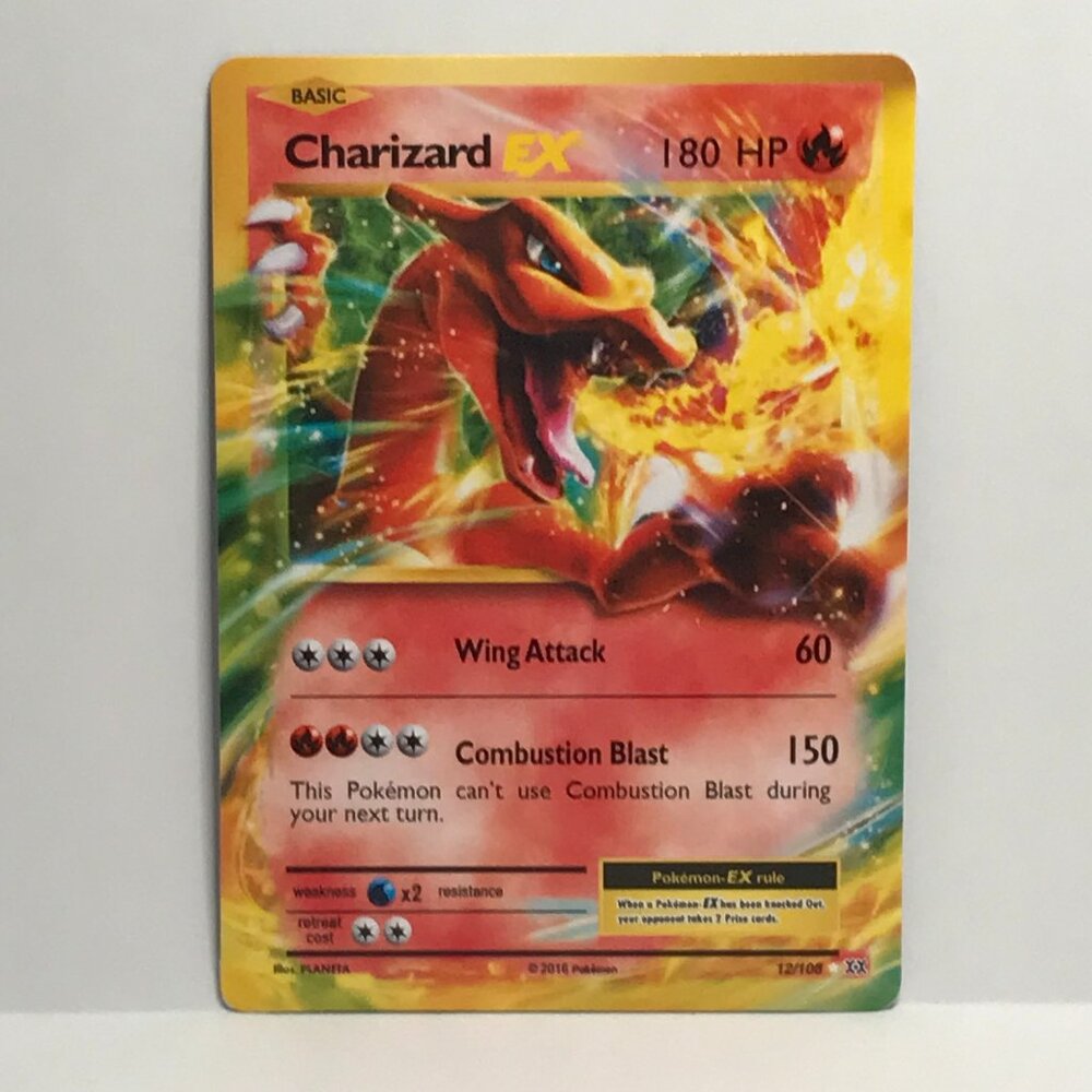Pokemon Trading Card - Charizard EX - 12/106 REPRINT